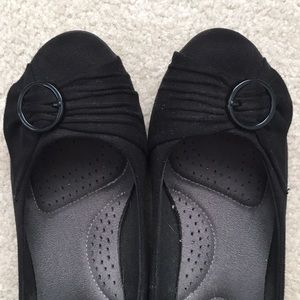 Size 8.5 Women’s Black wedge dress shoes.